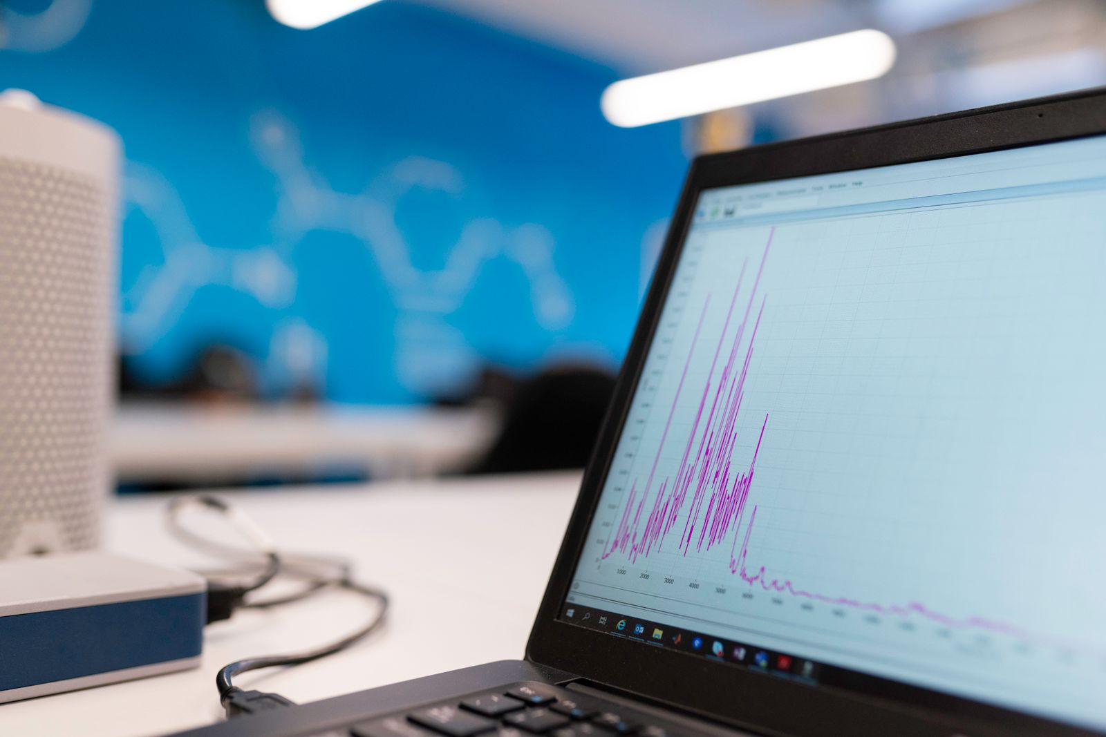 Laptop screen displaying data and analytics graphs