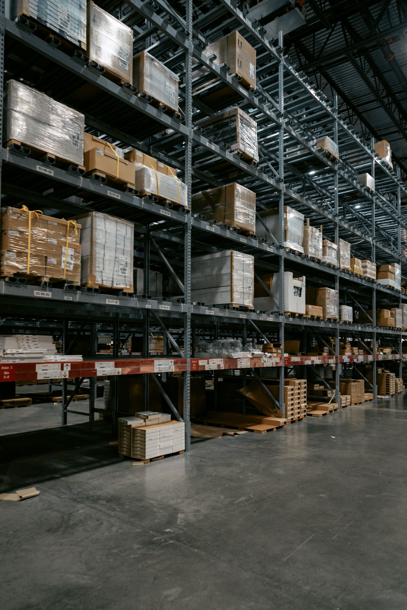 Interior of a modern pharmaceutical distribution warehouse with tall storage racking